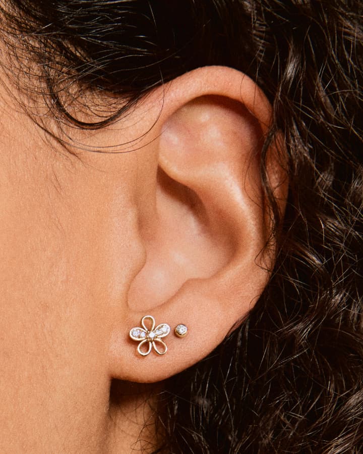 “WE REIMAGINED THE TRADITIONAL FLORAL MOTIF WITH A LIGHTER TOUCH—BALANCING NEGATIVE SPACE AND DIAMONDS FOR SOMETHING THAT FEELS MODERN, PLAYFUL, AND COMPLETELY UNFUSSY.” &nbsp; —Lauren Sehner,&nbsp; Senior Jewelry Designer