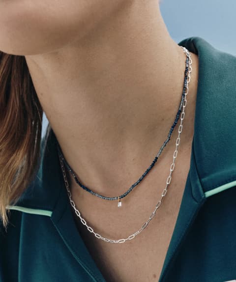 New drilled lab grown diamond necklace on neck.
