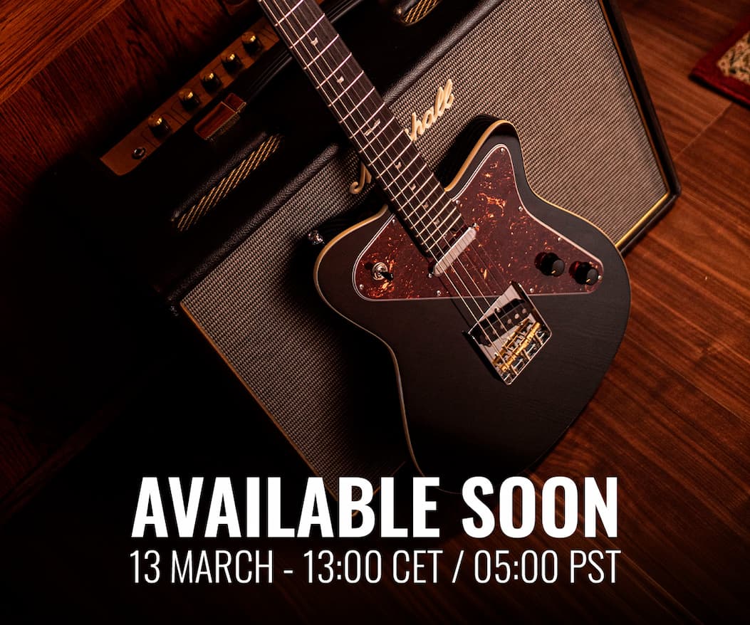 an image of a man playing a guitar on stage with a crowd