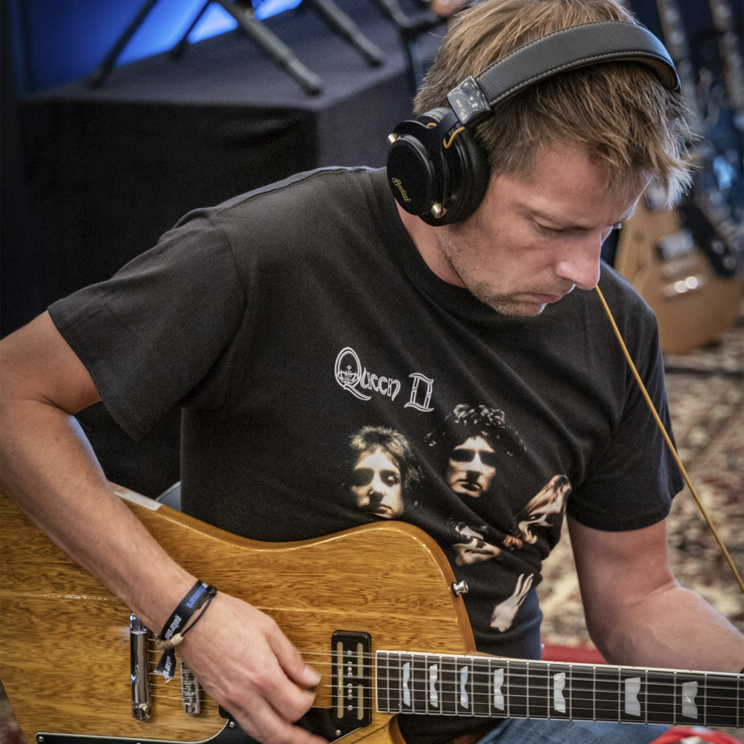 guitar player with studio headphones