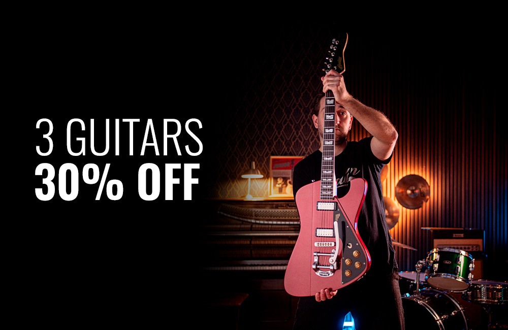 an image of a man playing a guitar on stage with a crowd