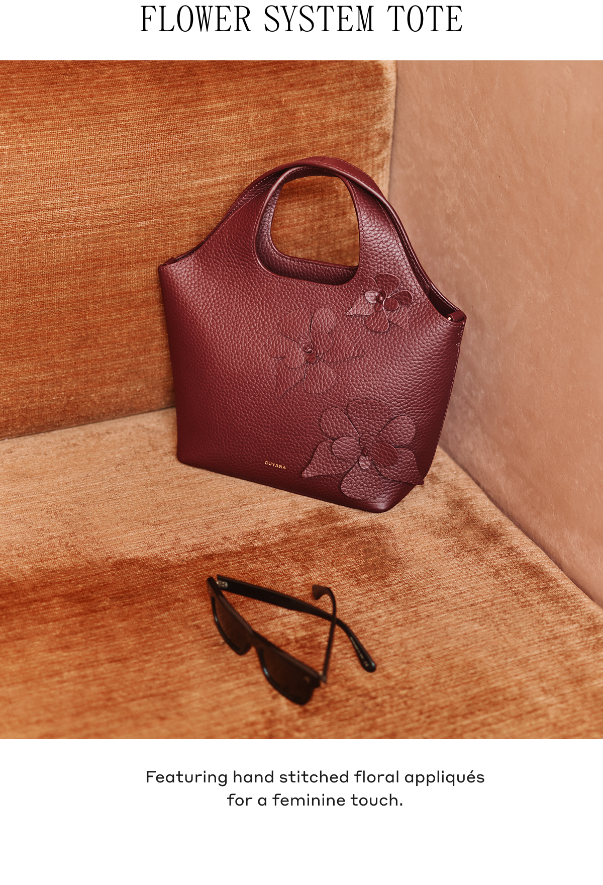 FLOWER SYSTEM TOTE Featuring hand stitched floral appliqués for a feminine touch.