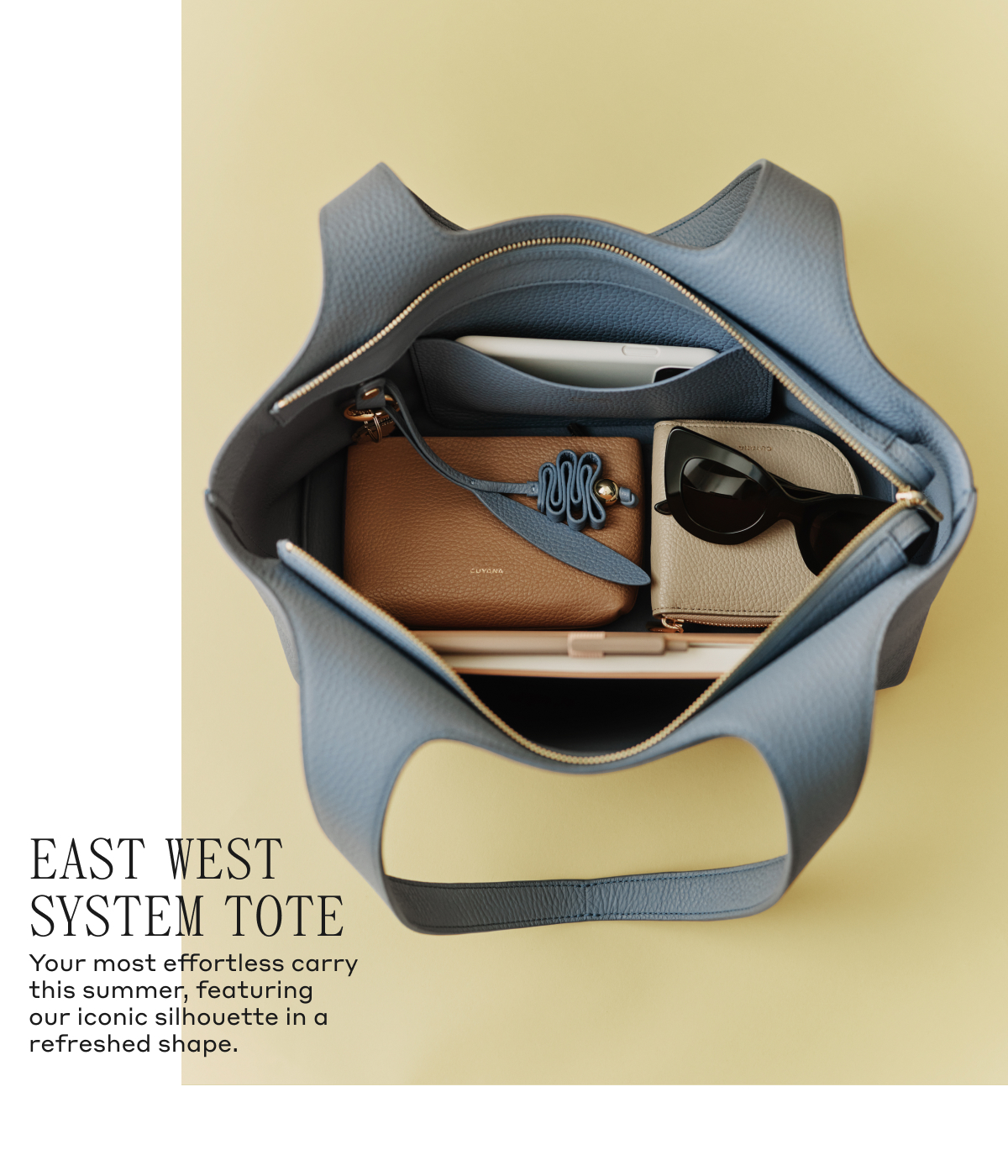 EAST WEST SYSTEM TOTE Your most effortless carry this summer, featuring our iconic silhouette in a refreshed shape.