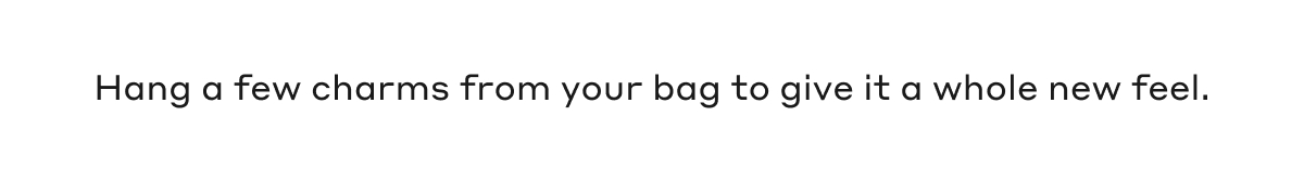 Hang a few charms from your bag to give it a whole new feel.