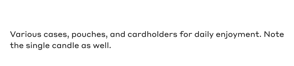 Various cases, pouches, and cardholders for daily enjoyment. Note the single candle as well.