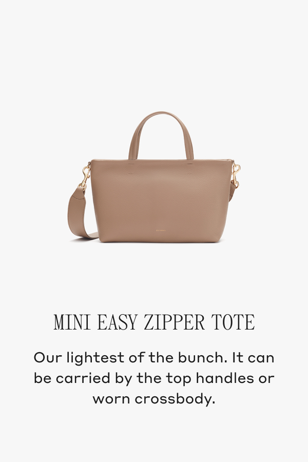 Mini Easy Zipper Tote Our lightest of the bunch. It can be carried by the top handles of worn crossbody.