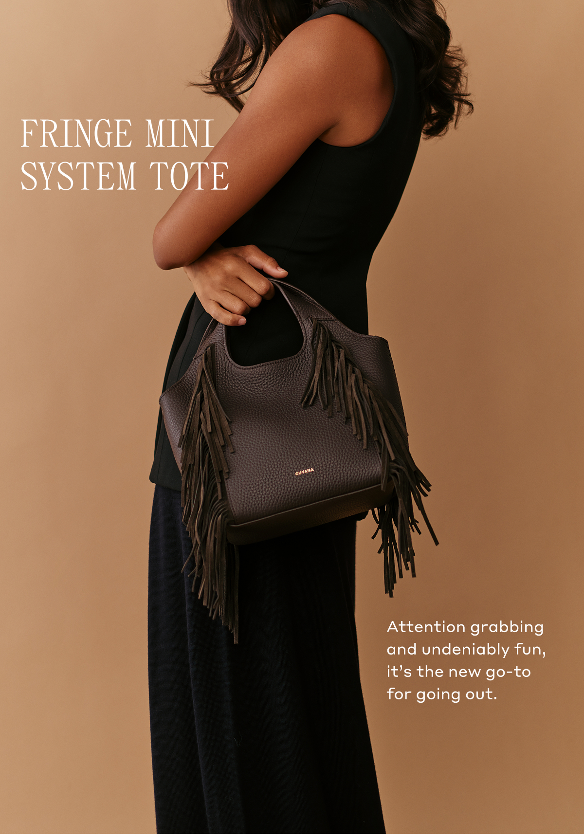 FRINGE MINI SYSTEM TOTE Attention grabbing and undeniably fun, it's the new go-to for going out.