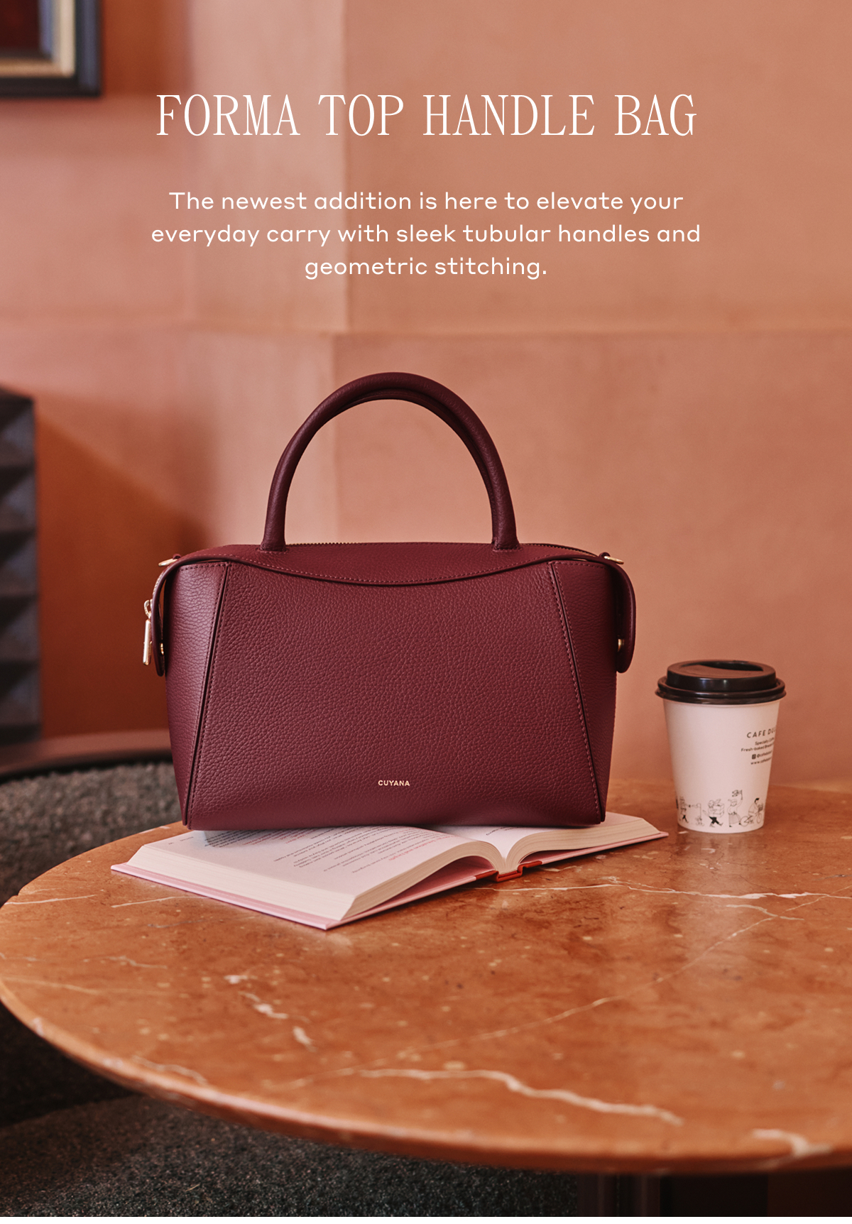 FORMA TOP HANDLE BAG The newest addition is here to elevate your everyday carry with sleek tubular handles and geometric stitching.