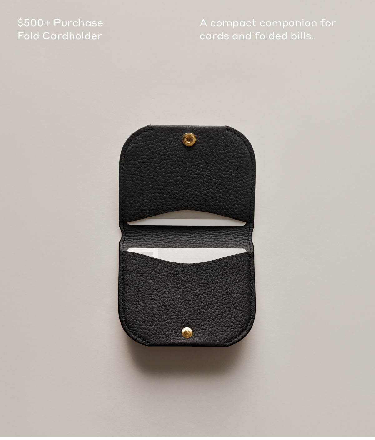 $500+ Purchase Cardholder A compact companion for cards and folded bills.
