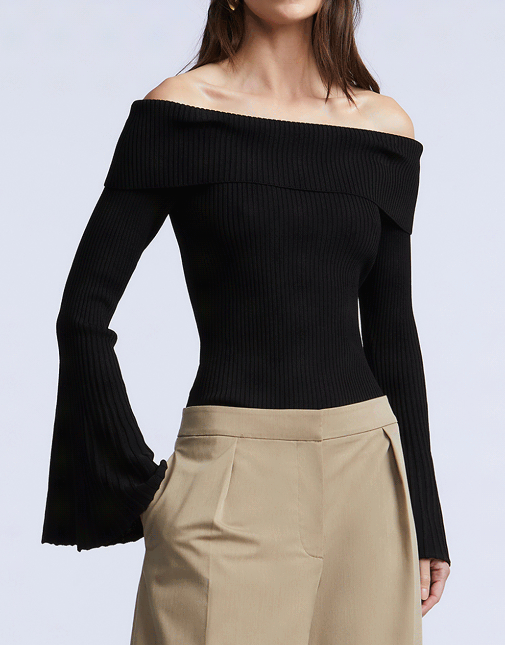 Your new go-to tops. Sleek knits, sculpted halters, and modern cuts that move from office hours to evening plans with ease.