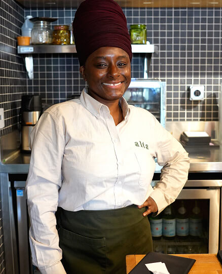 Alta wears Smith Oxford Shirt in Oatmeal