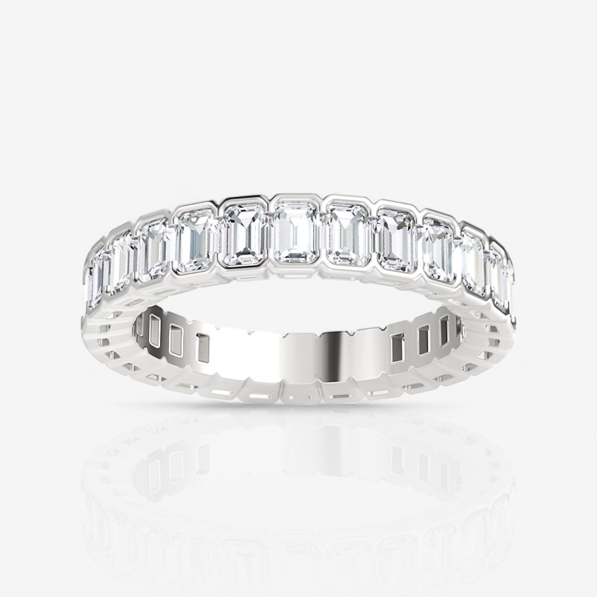 Half bezel emerald cut eternity ring