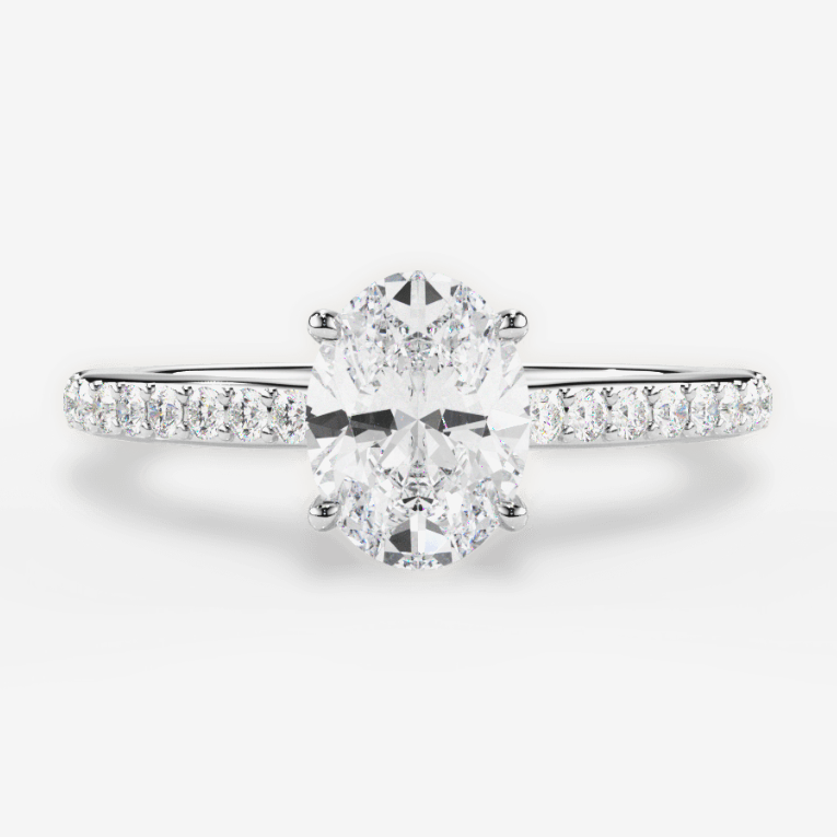 white gold diamond engagement ring with oval center stone and hidden halo 