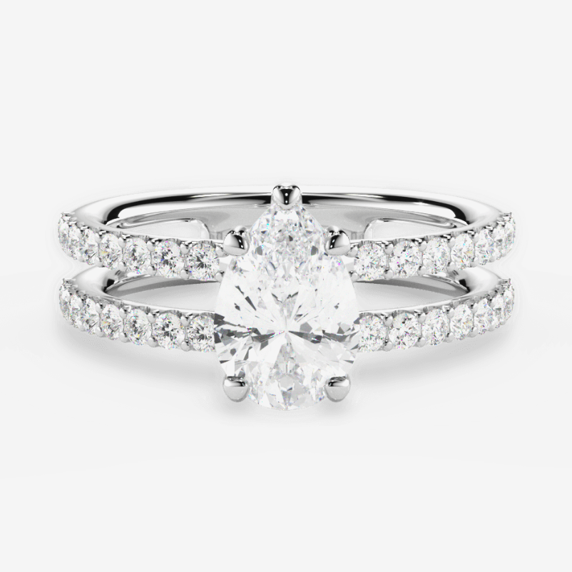 yellow gold diamond engagement ring with cluster sidestones and marquise center stone