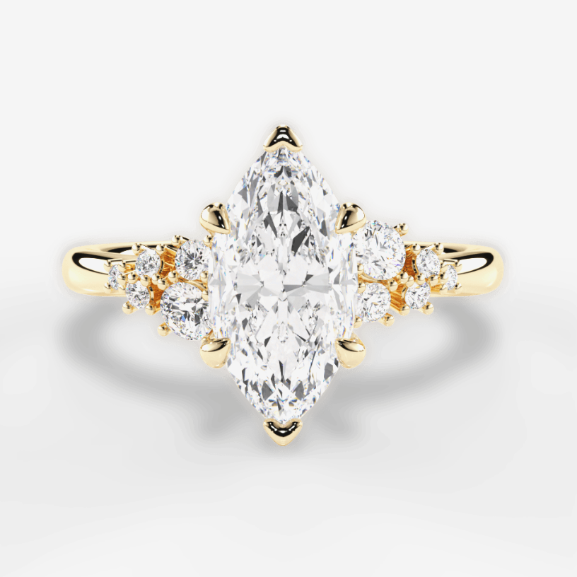 yellow gold diamond engagement ring with cluster sidestones and marquise center stone