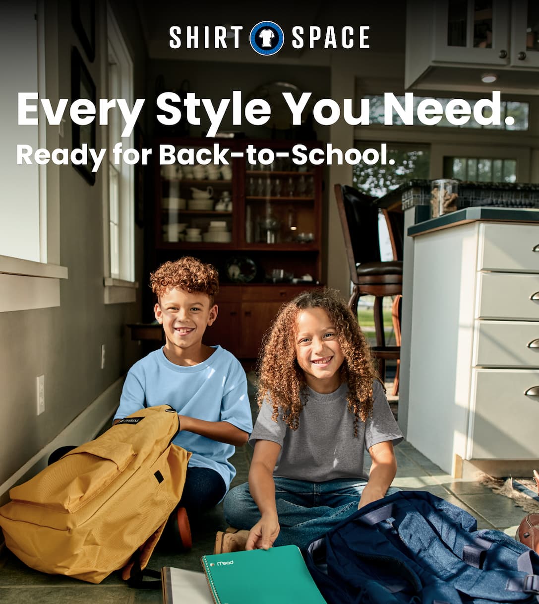 Kids packing for first day of school in ShirtSpace blank apparel 