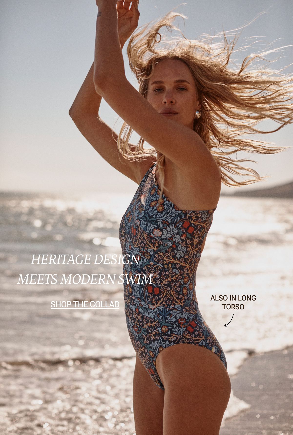 Model wearing a Morris & Co. x Summersalt printed one piece swimsuit on the beach