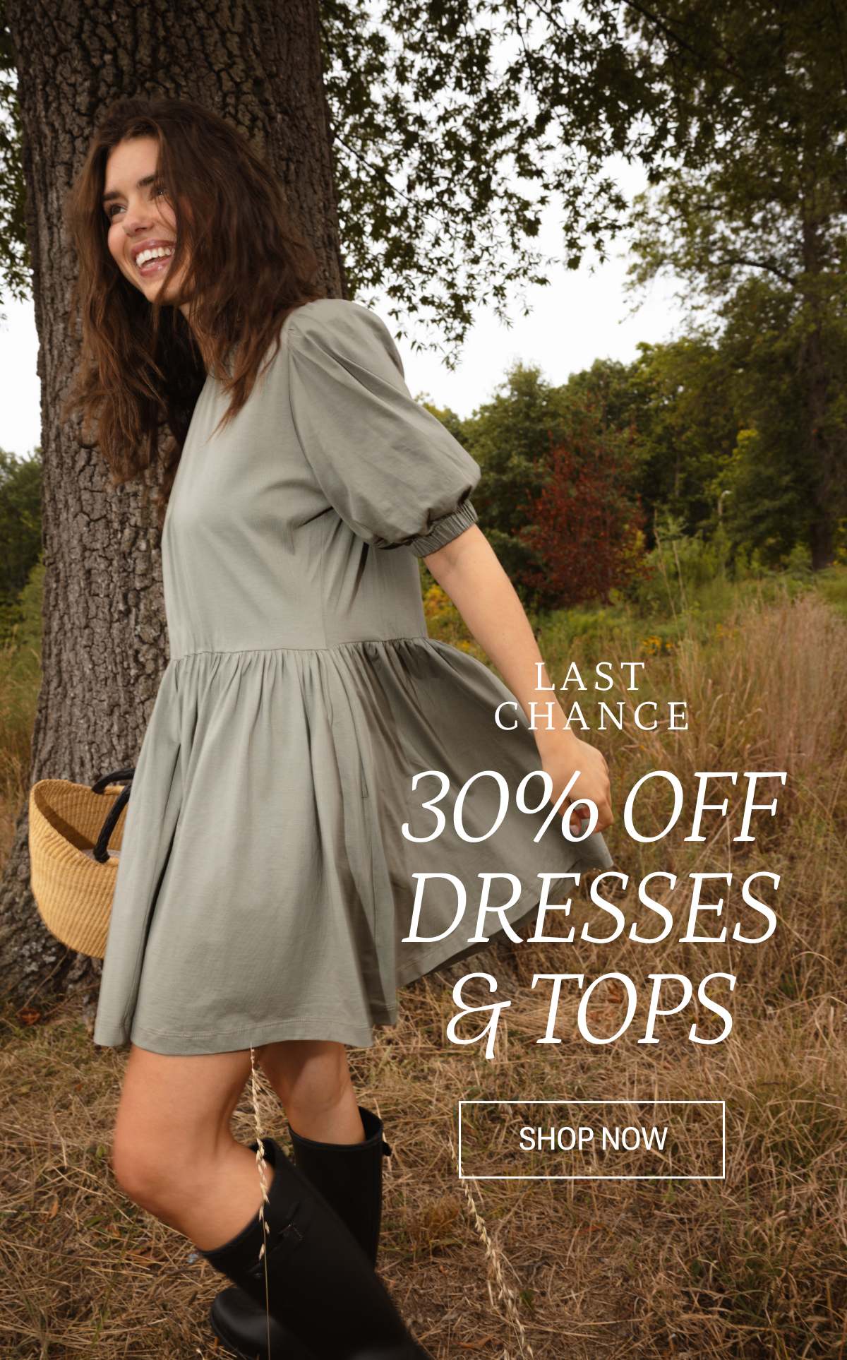 Text: Last Chance 30% off Dresses & Tops Shop Now. Model is the Luxe Pima Puff-Sleeve Mini Dress in Agave (green)