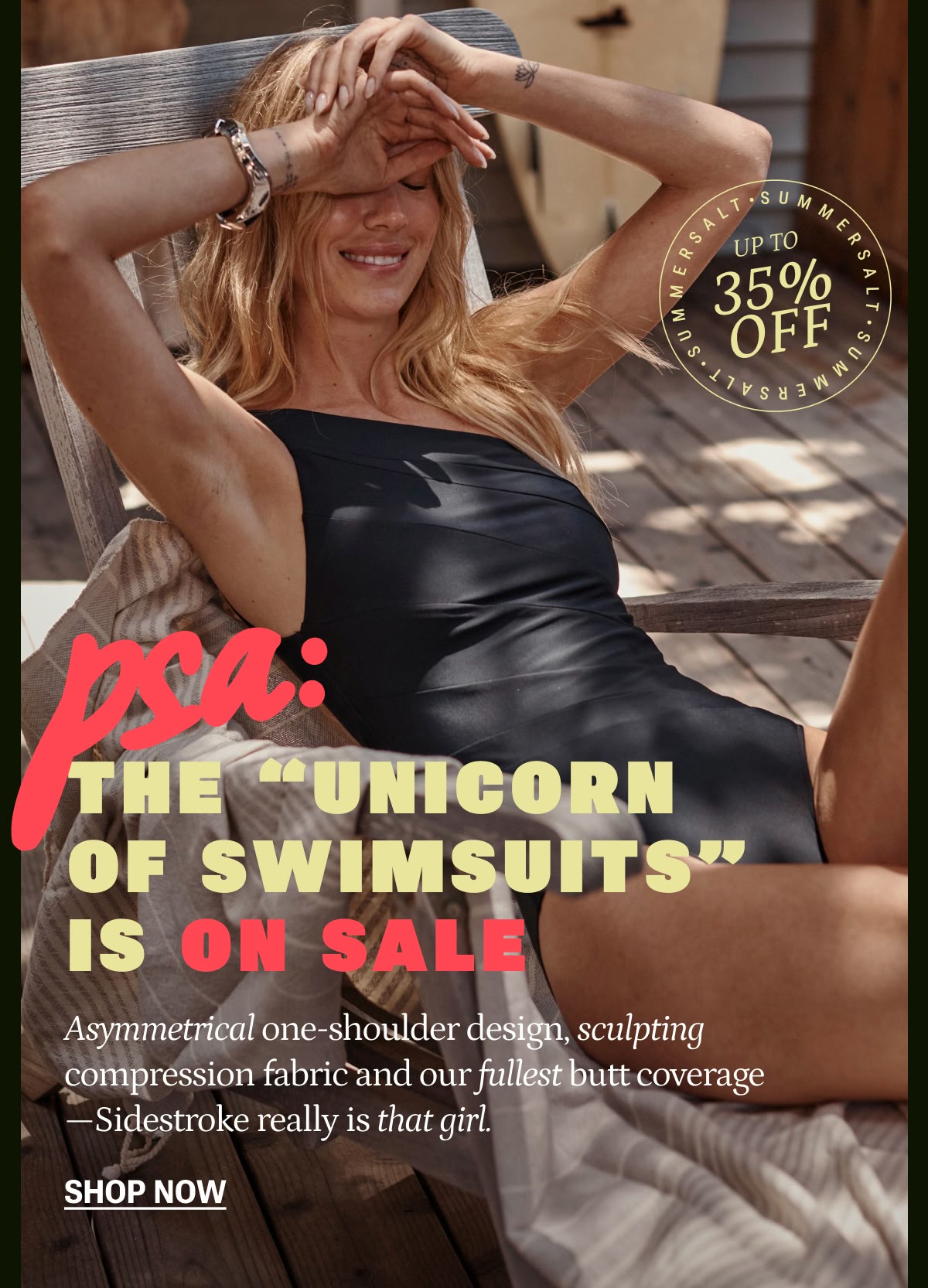 Model in black one piece swimsuit