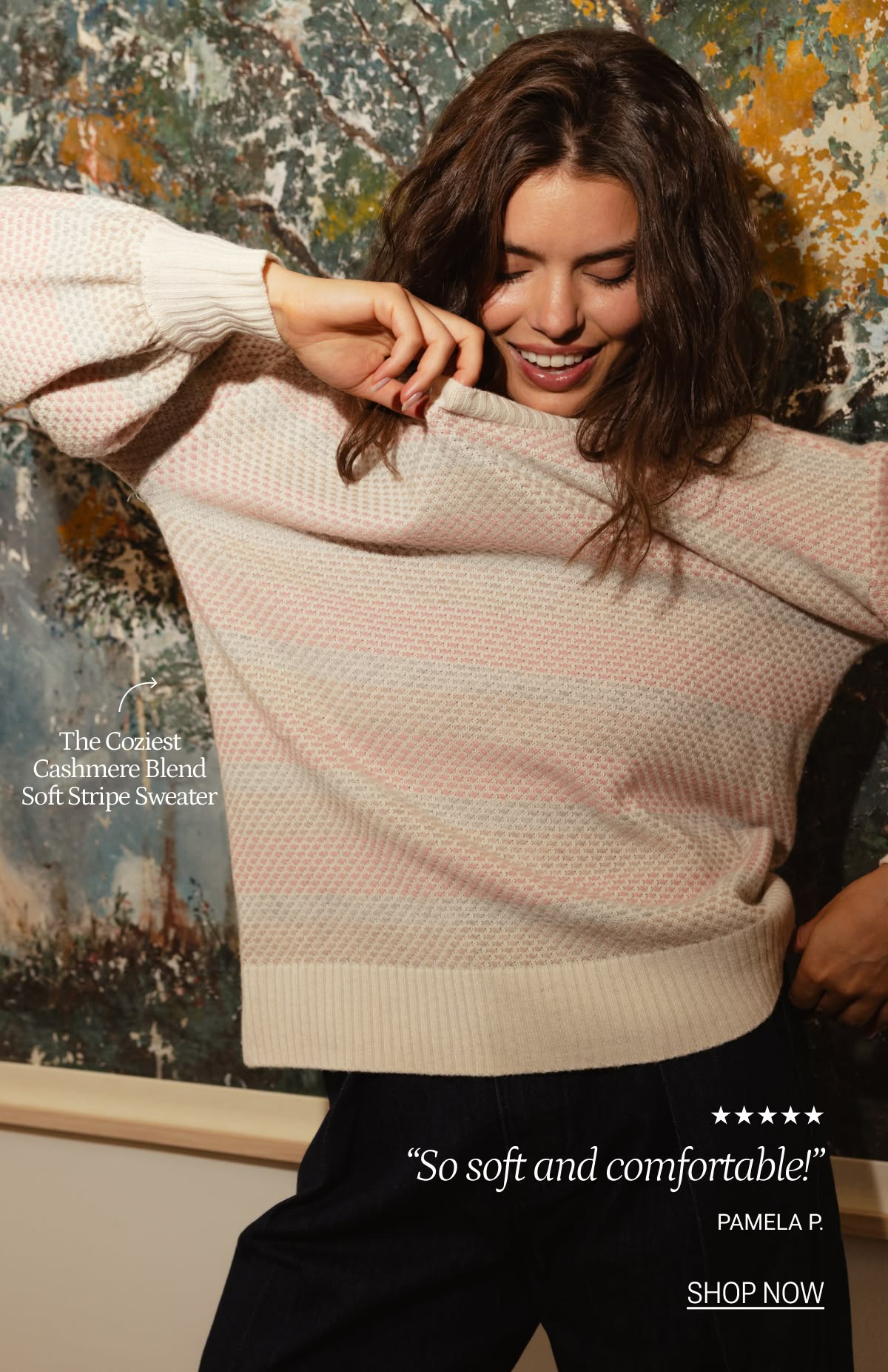 Model in rainbow striped cashmere sweater Model in rainbow striped cashmere sweater