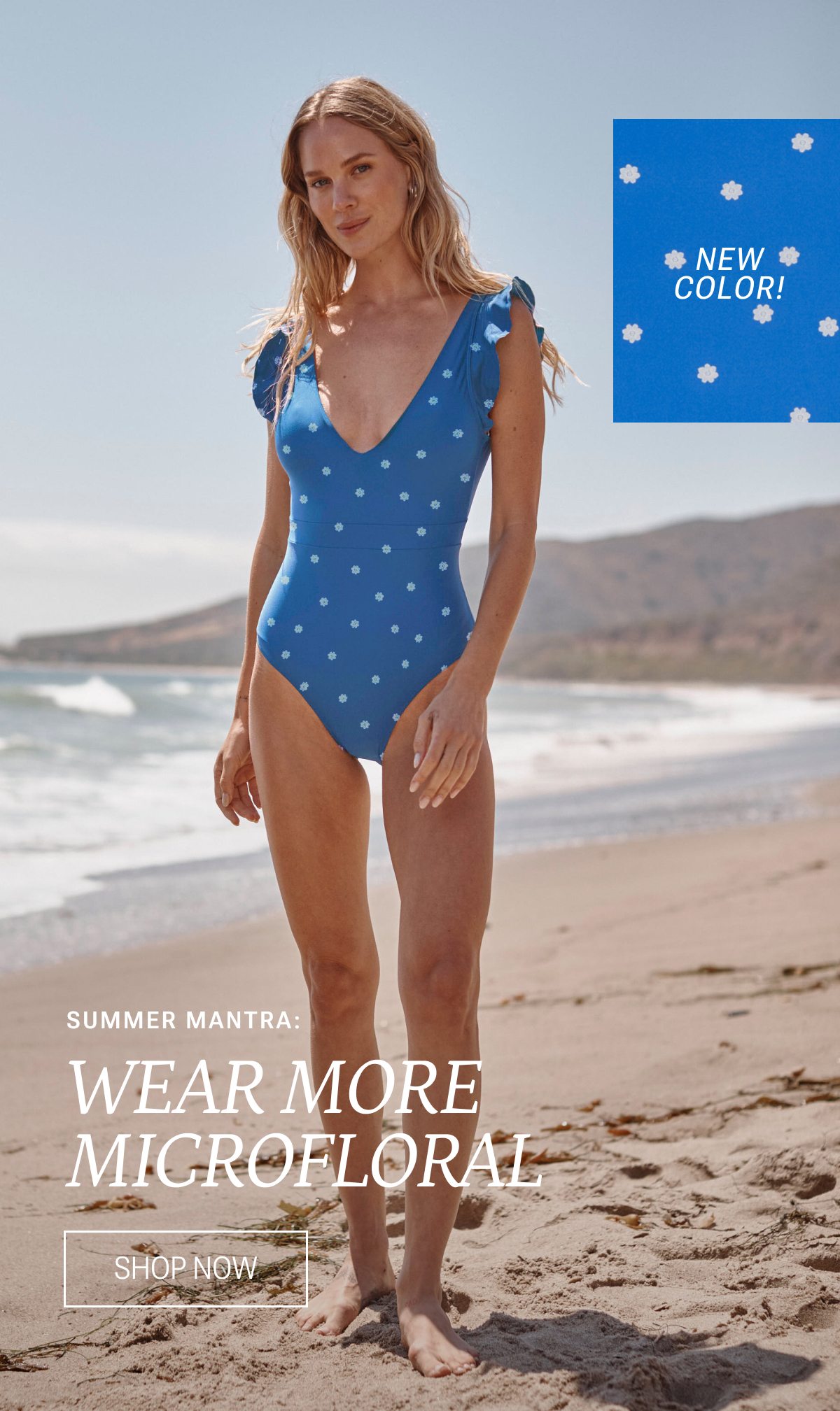Model wearing a blue and white tiny floral printed one piece swimsuit