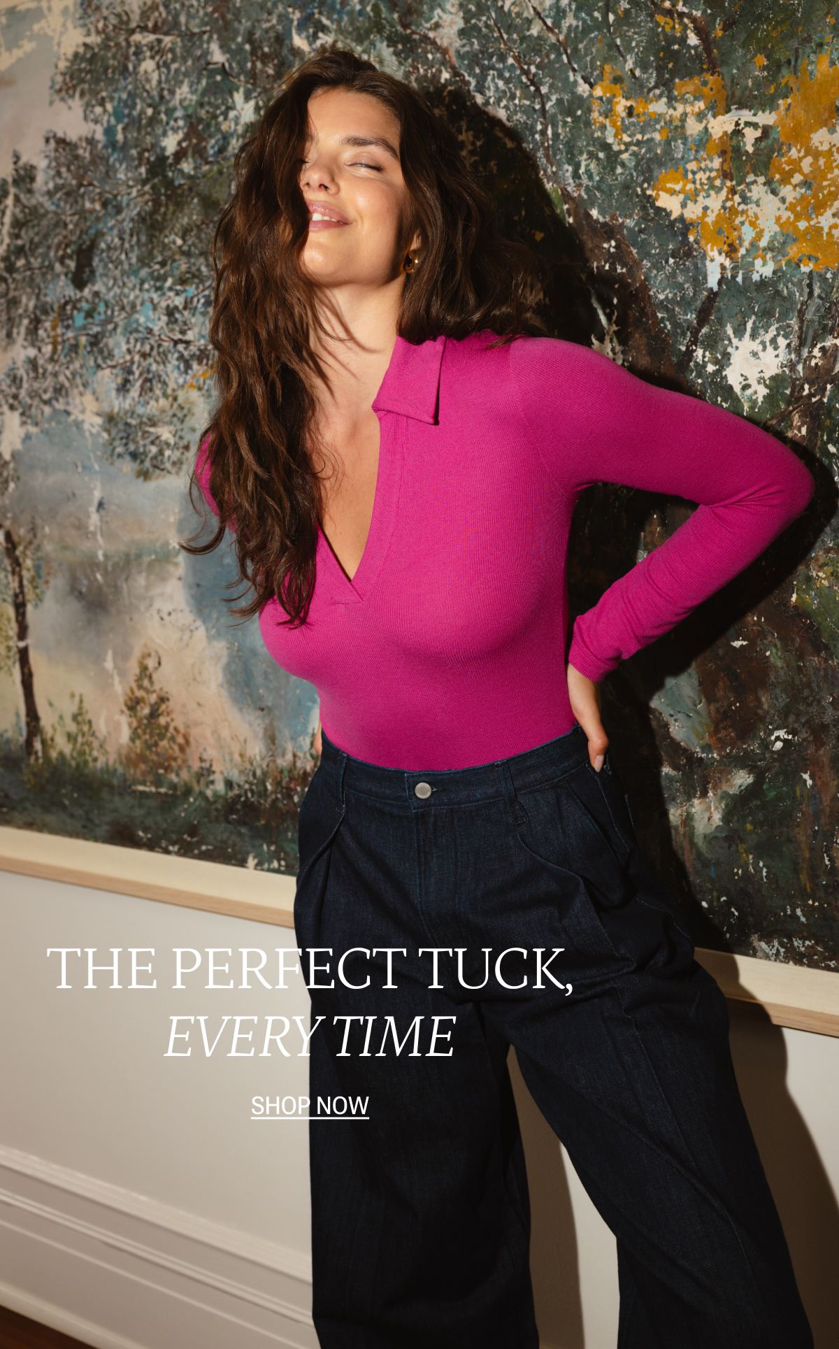 Model in pink collard bodysuit