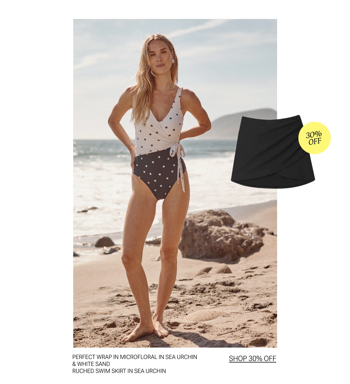 Model in microfloral printed one piece swimsuit