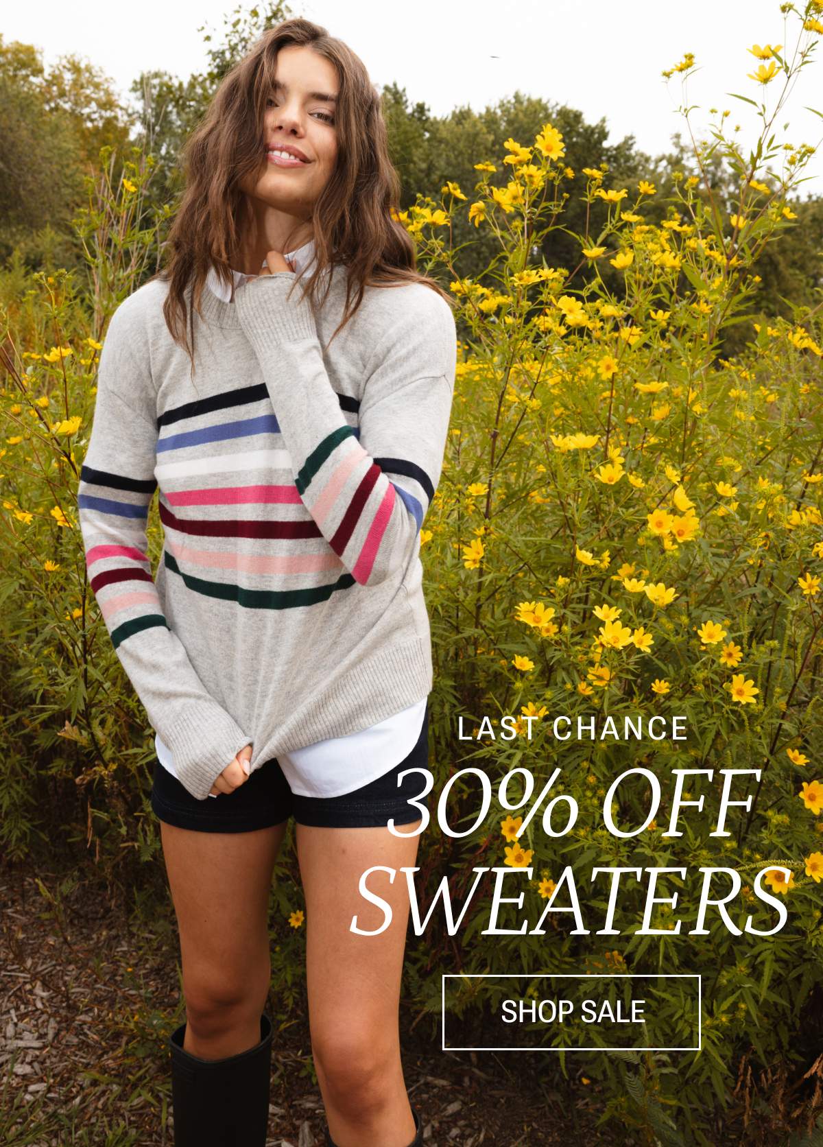 Model in gray and striped sweater