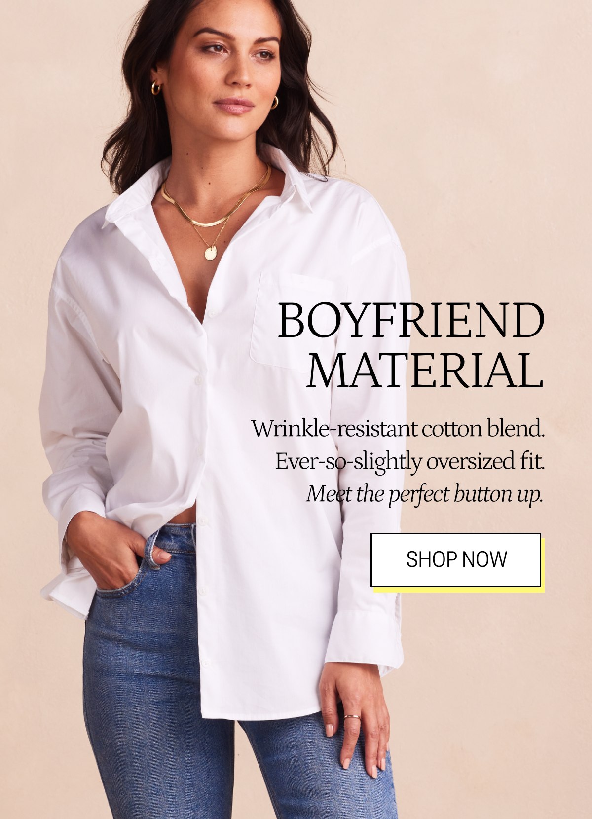 Model wearing a white button up boyfriend shirt