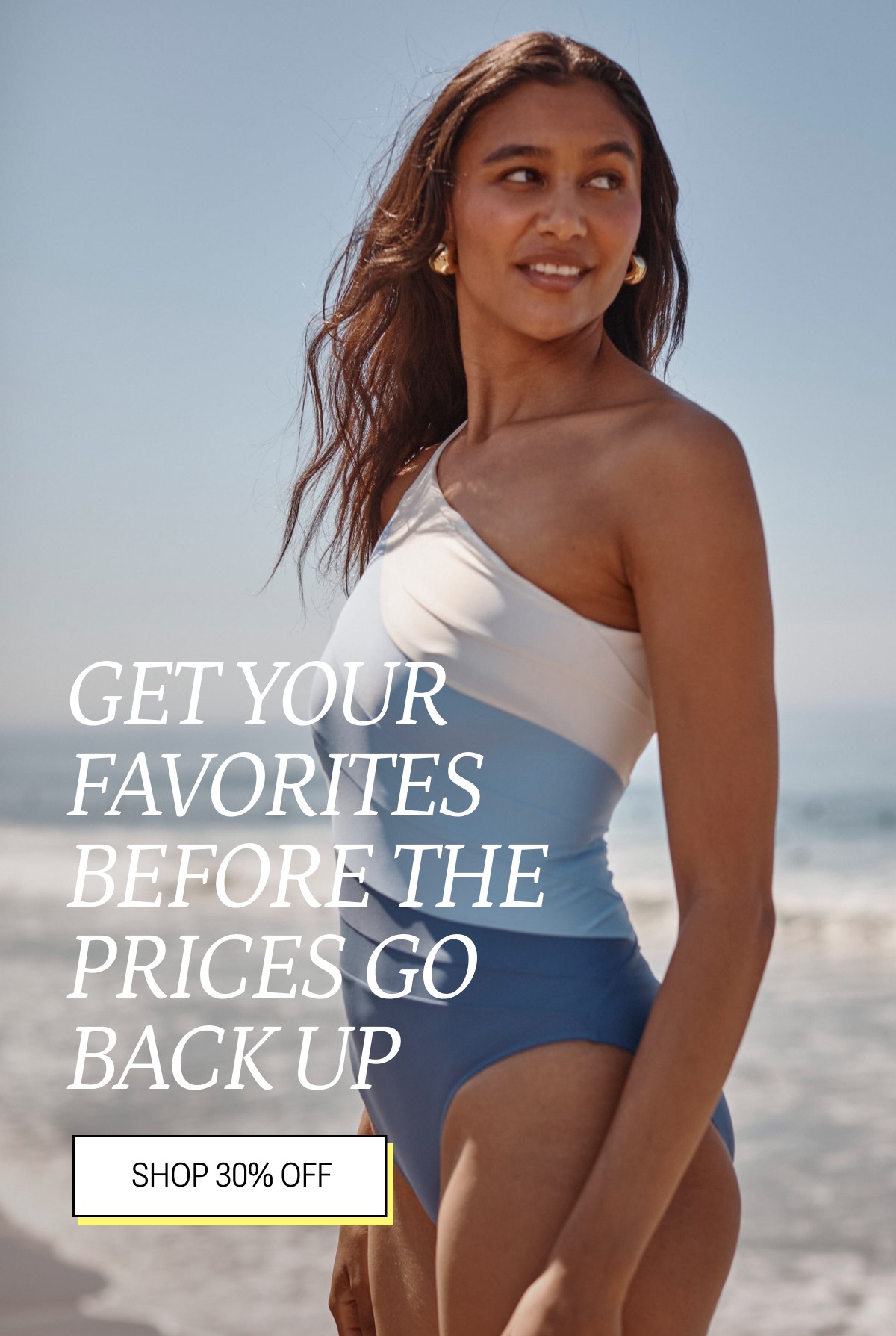 Model in blue and white one piece swimsuit