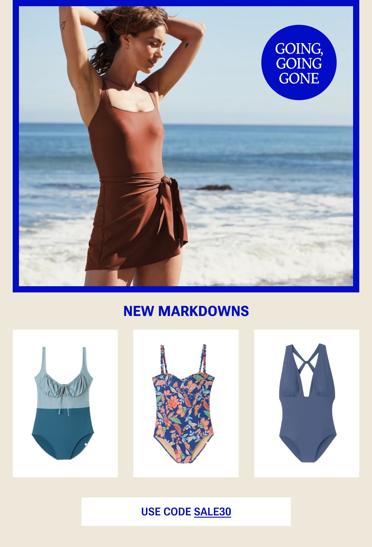 Model in brown swim dress