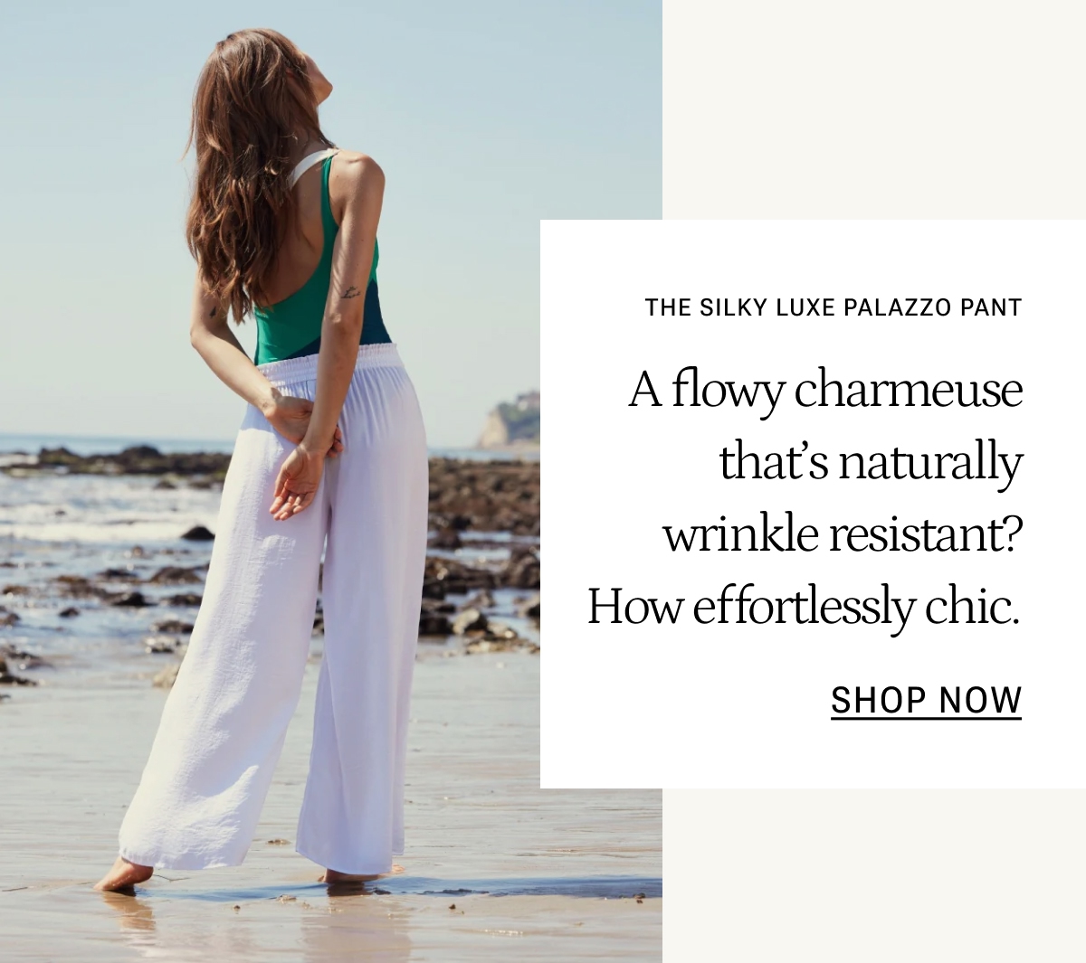 Model in white palazzo pants and multi-colored one piece swimsuit