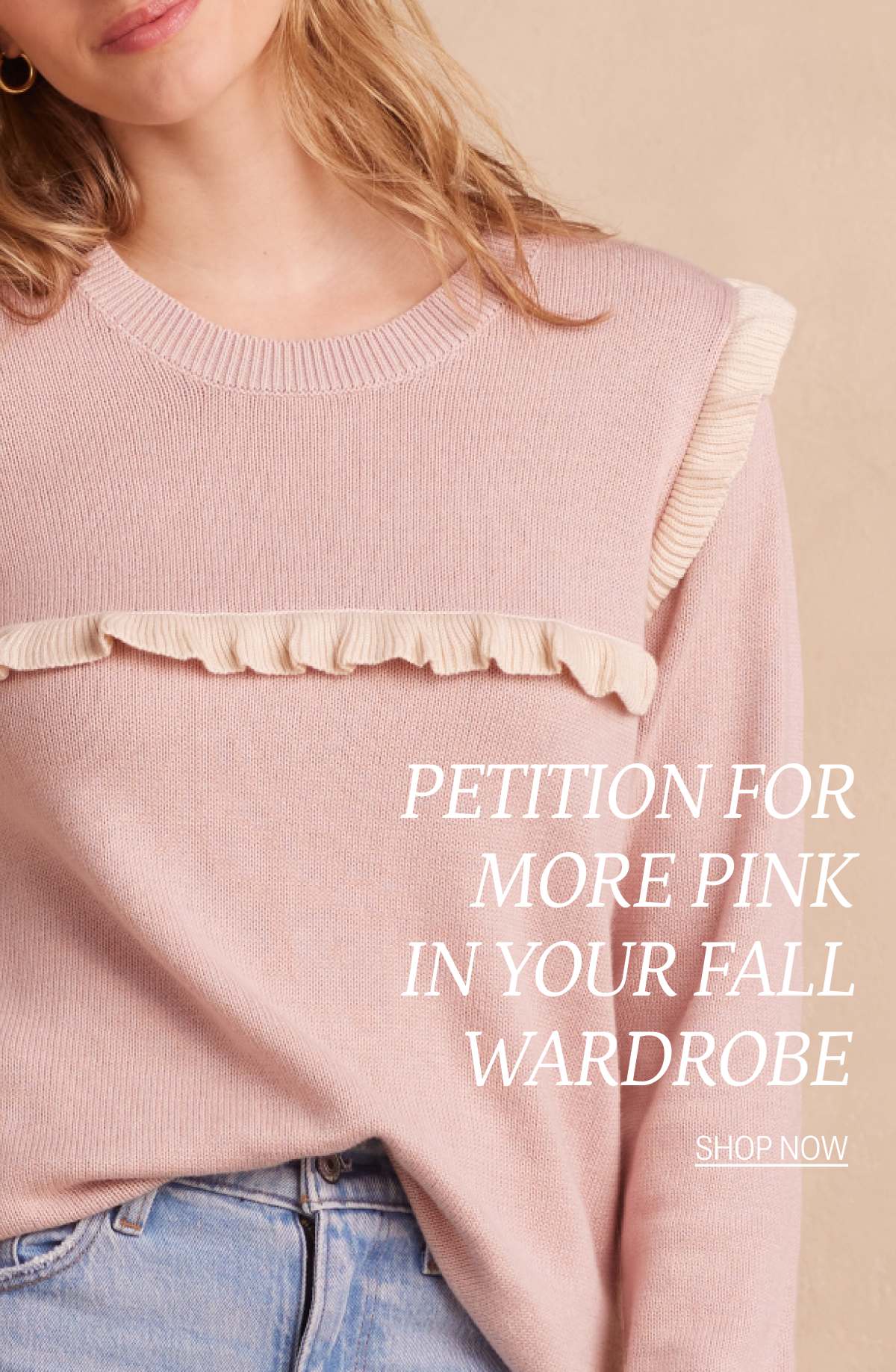 Model wearing pink ruffle sweater