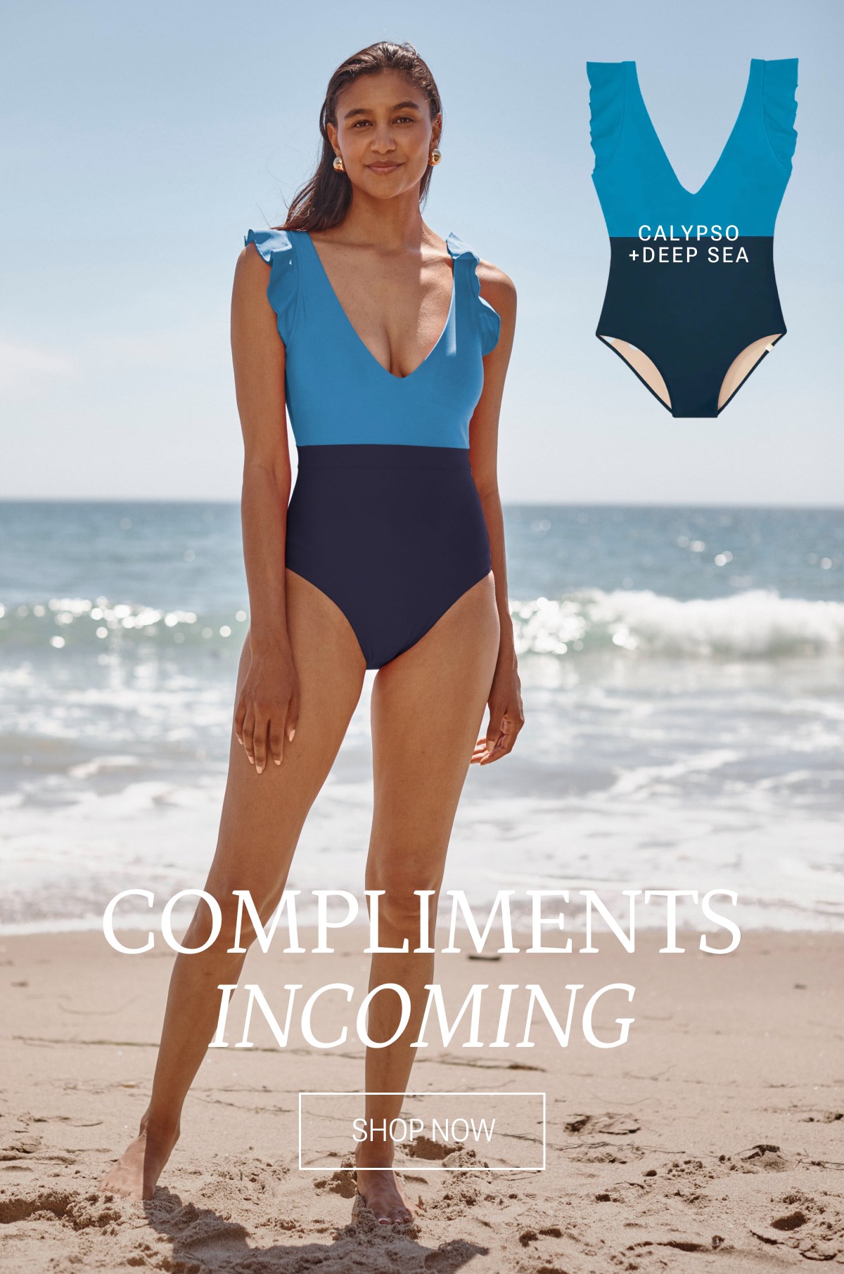 Model wearing blue colorblock one piece swimsuit on the beach