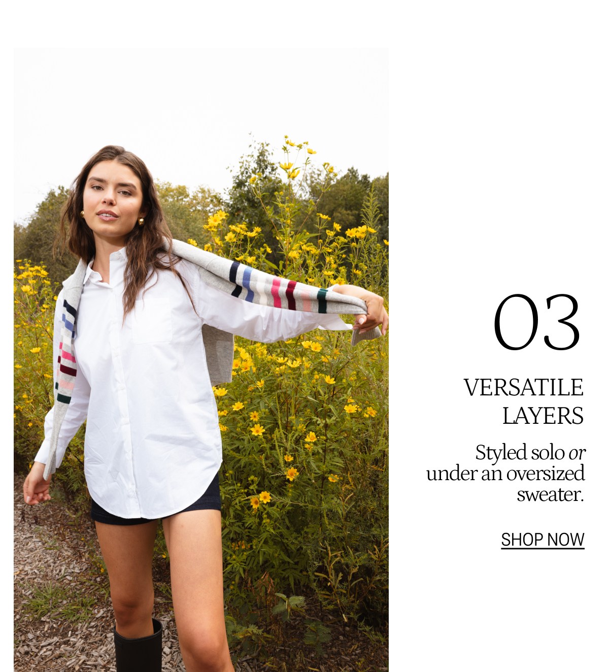 Model in white button down and gray & colorful striped sweater over shoulders