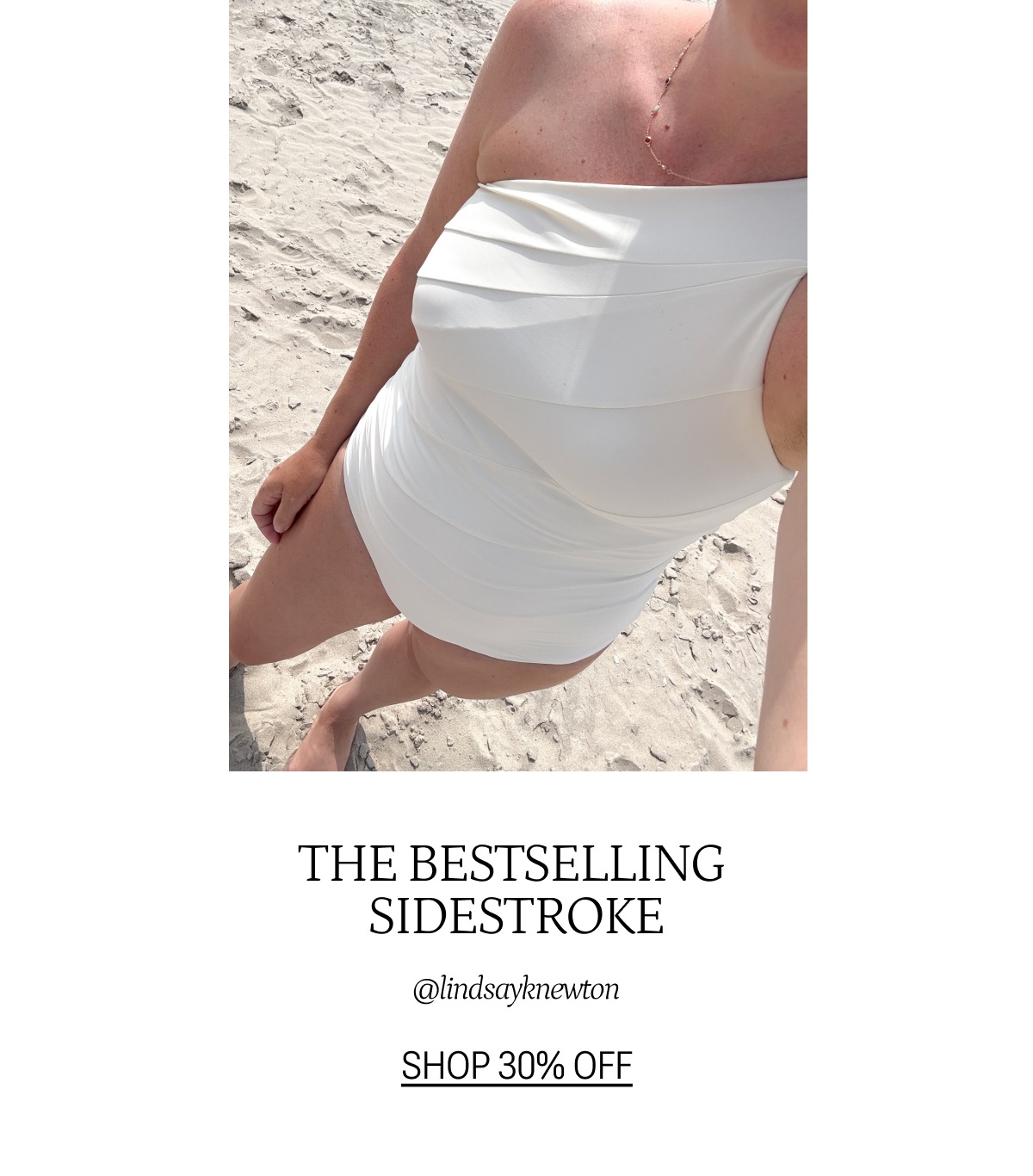 Model wearing white one piece swimsuit