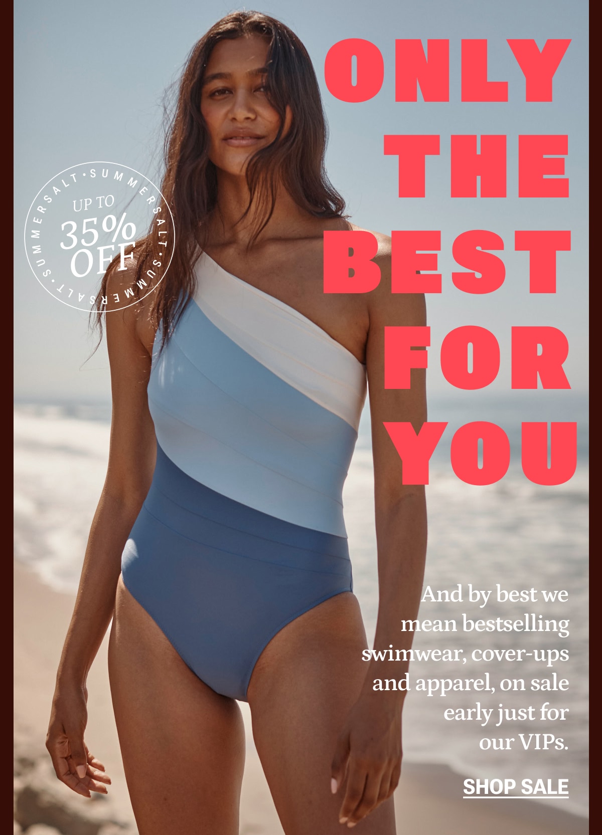 Model in blue and white one piece swimsuit