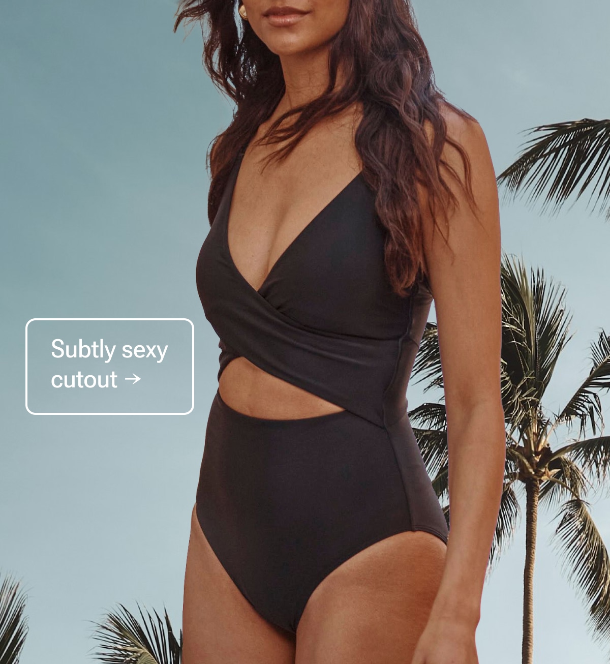 Model in black cutout one piece swimsuit