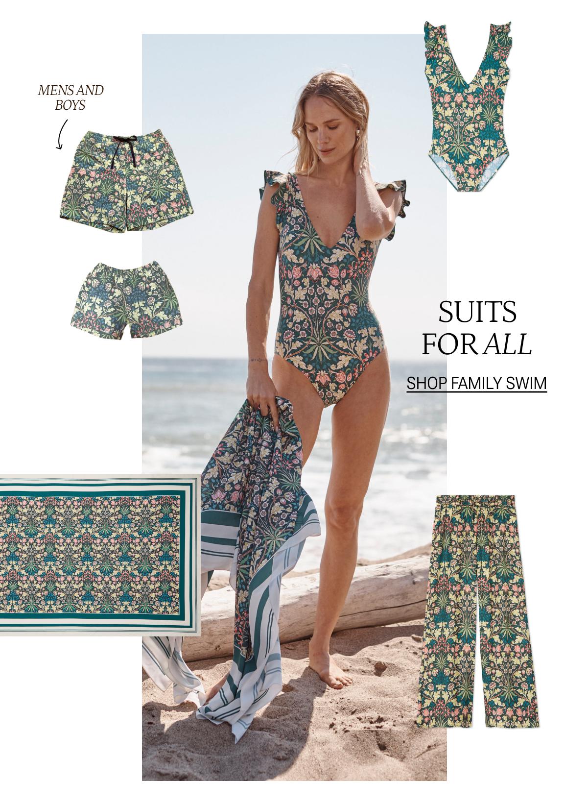 Model wearing a floral printed one piece swimsuit on the beach