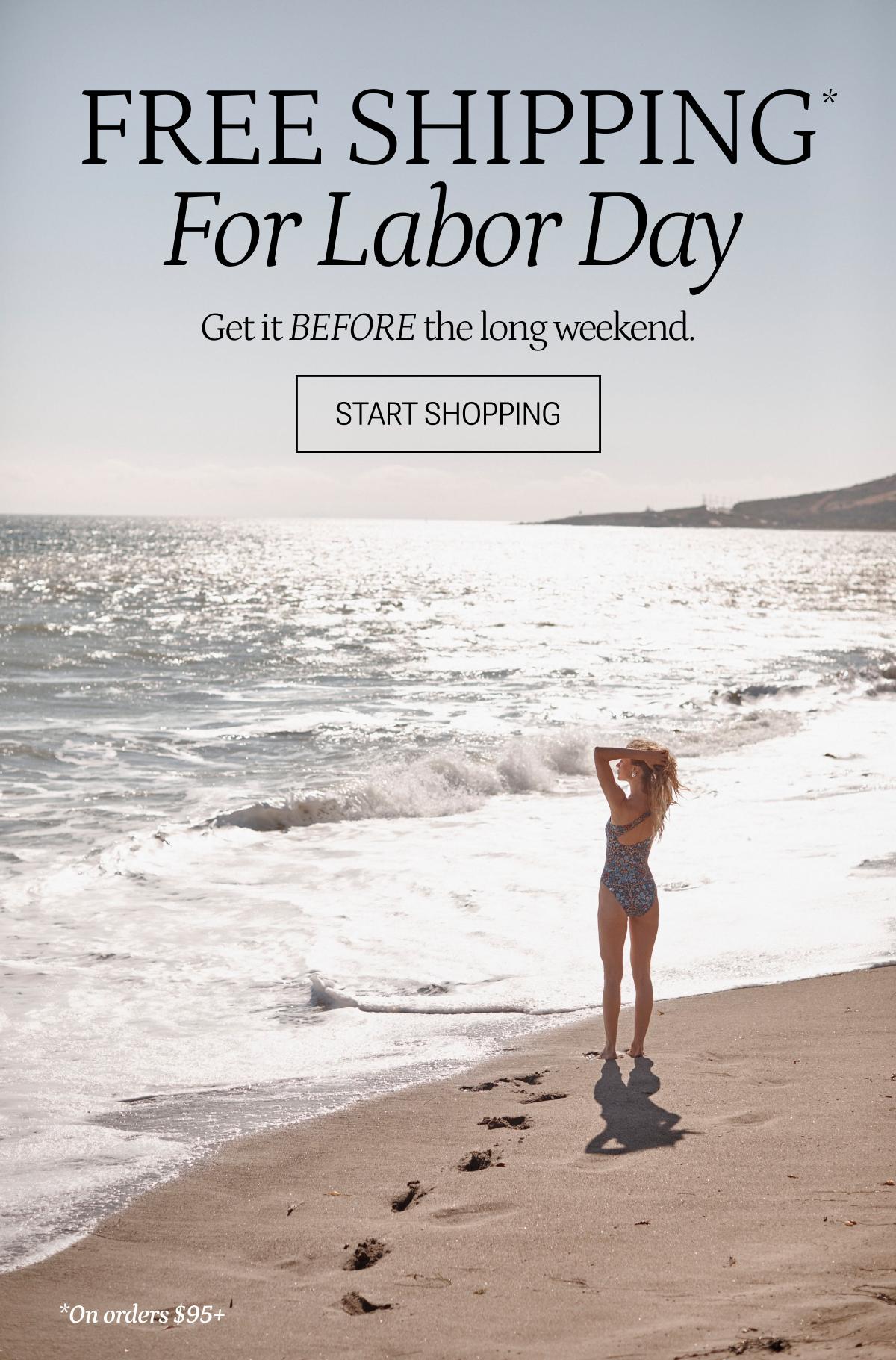 Model in one piece swimsuit on the beach