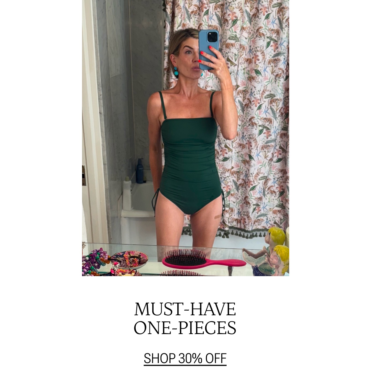 Model wearing one piece swimsuit