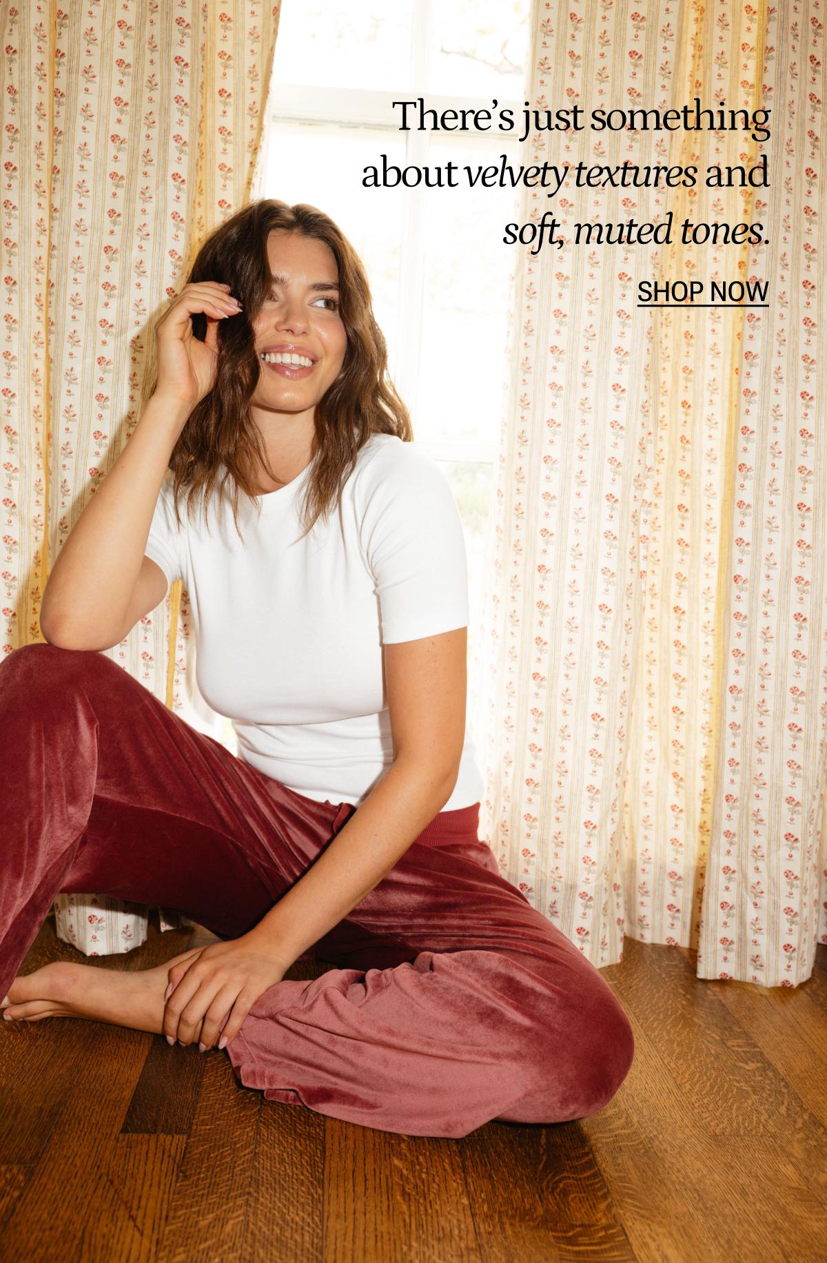 Model in rosewood velour lounge pants