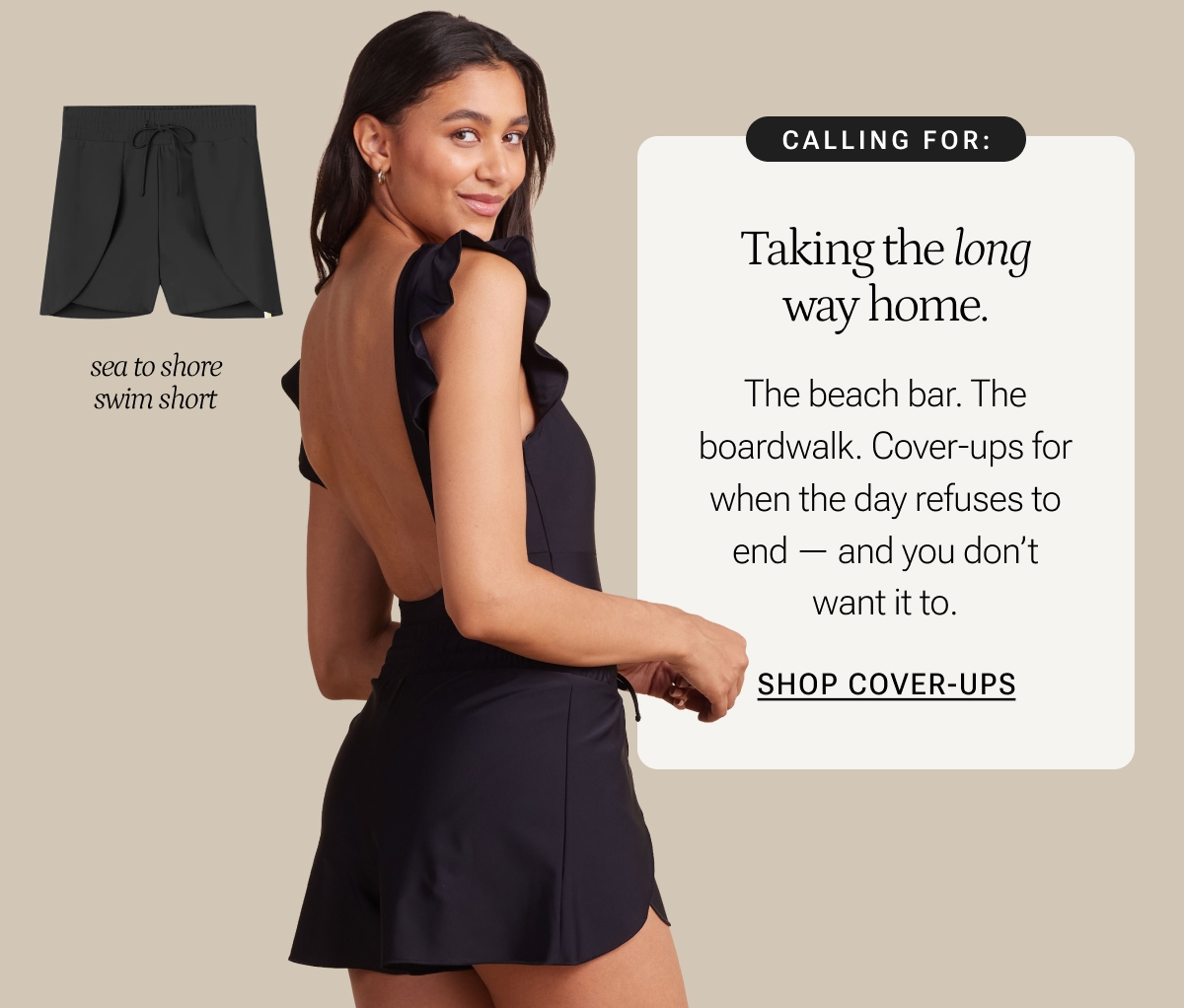 Model in black one piece swimsuit and matching swim shorts