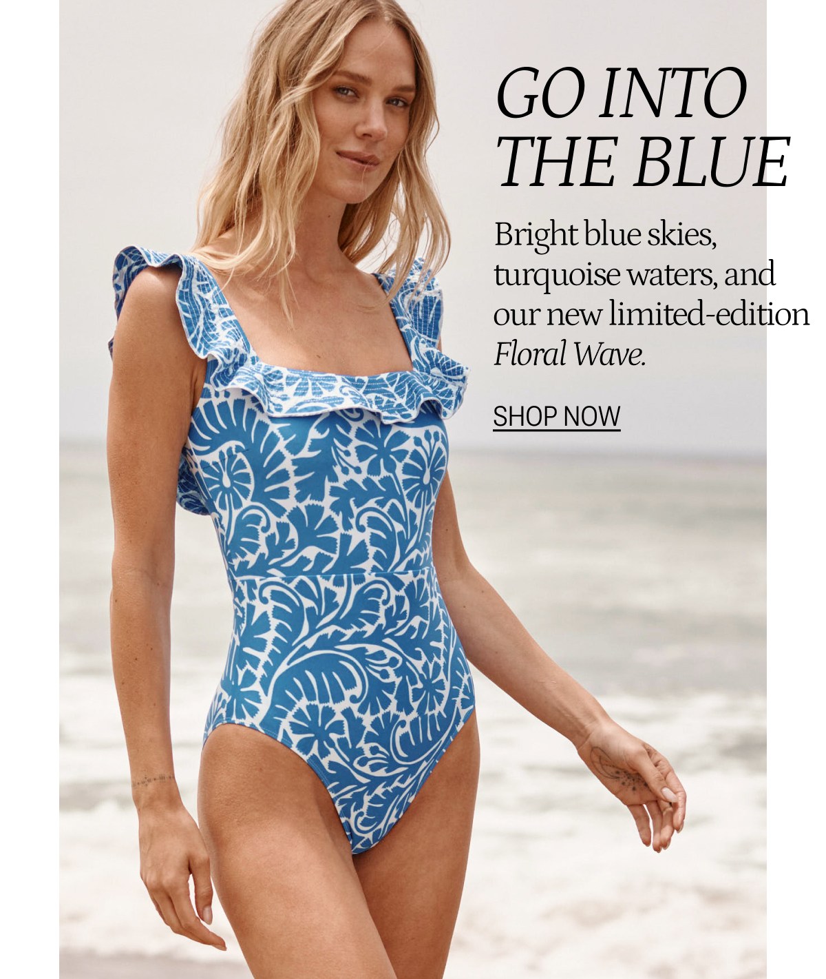 Model wearing a blue floral print one piece swimsuit