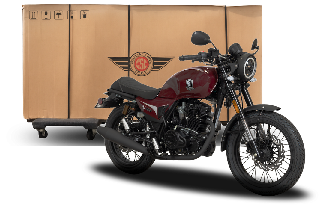 Maroon SG250 Cafe Racer in front of a Shipping Box