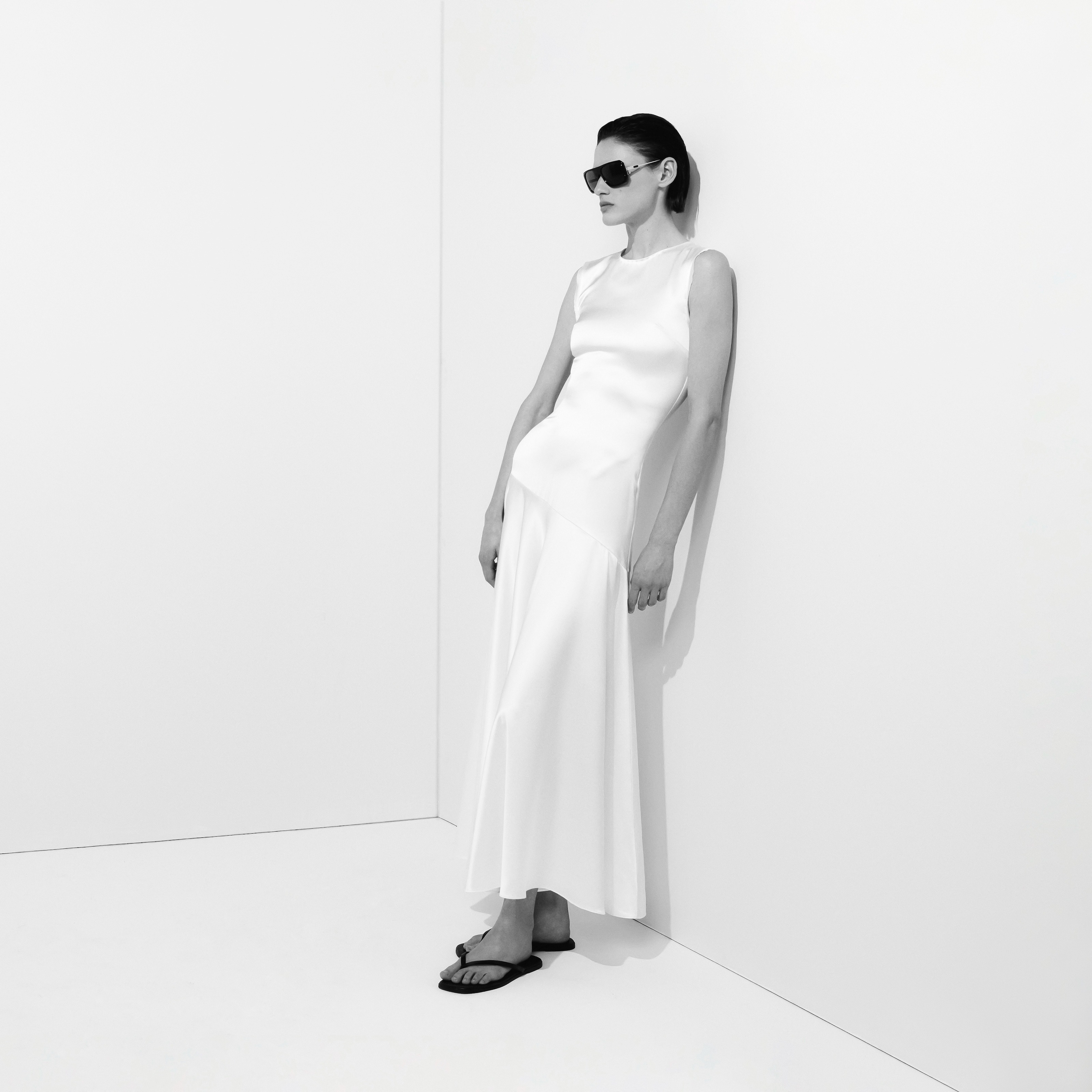 Editorial image of a model wearing the gwenyth dress in ivory