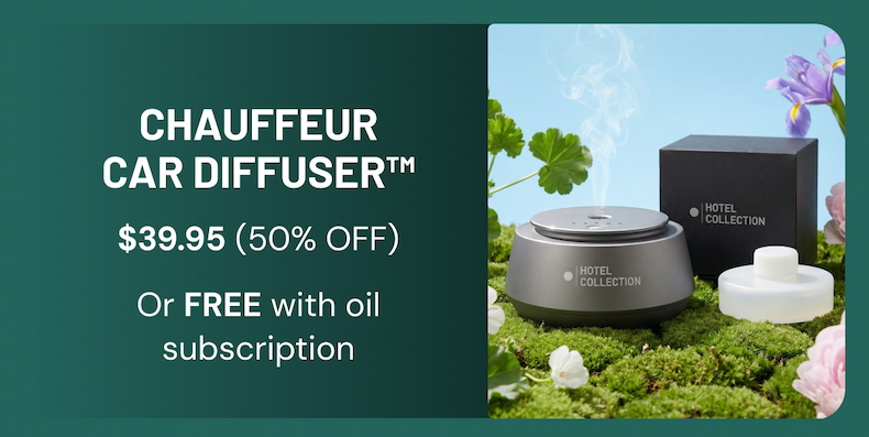 an image of a bottle of perfume sitting on a moss covered ground