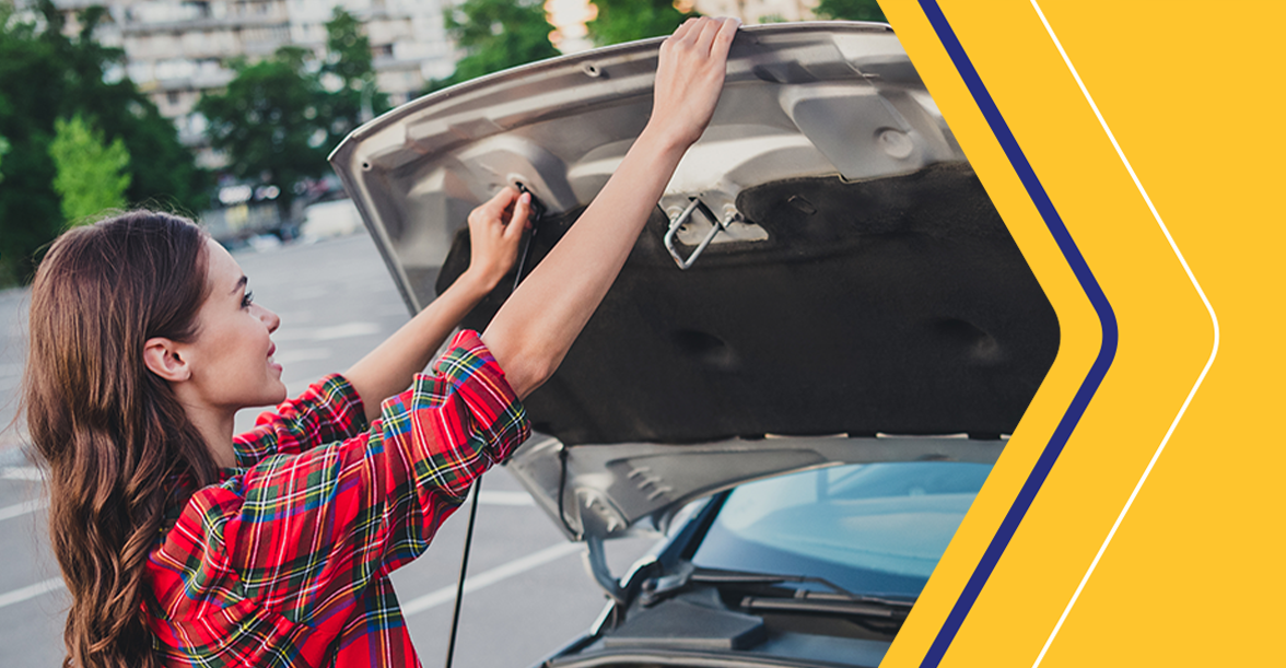 Woman closing car trunk
