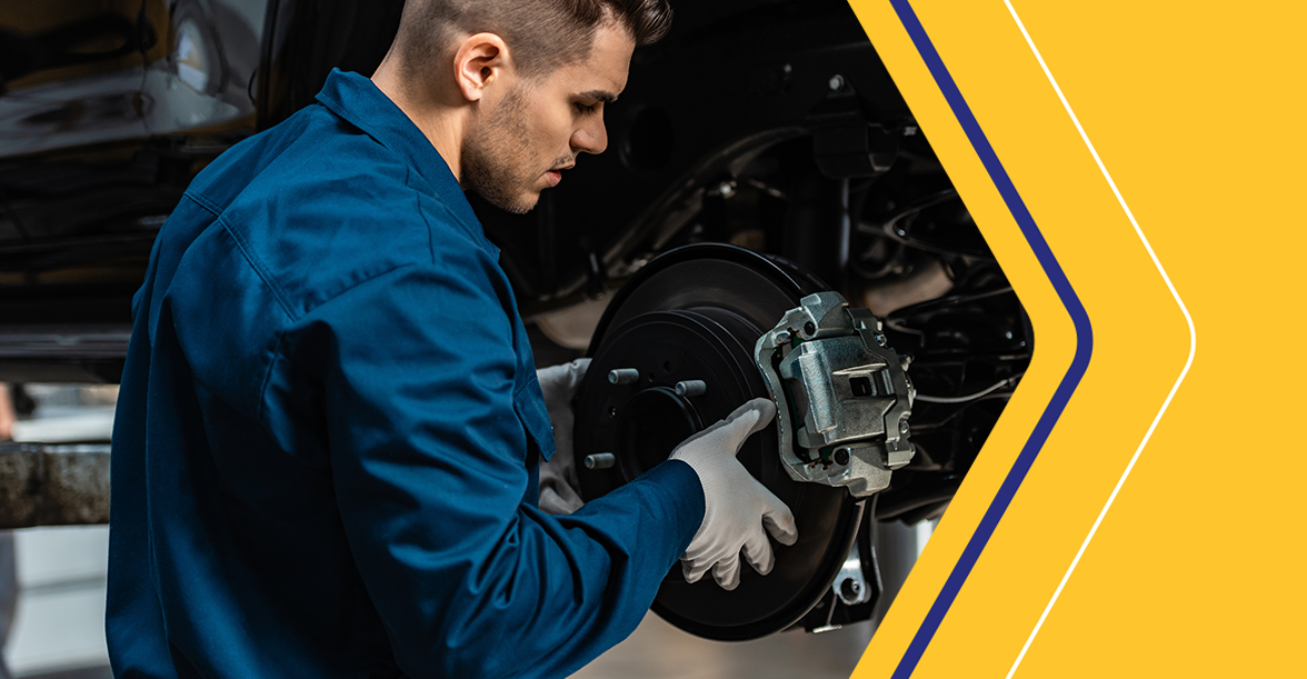 Man replacing brakes