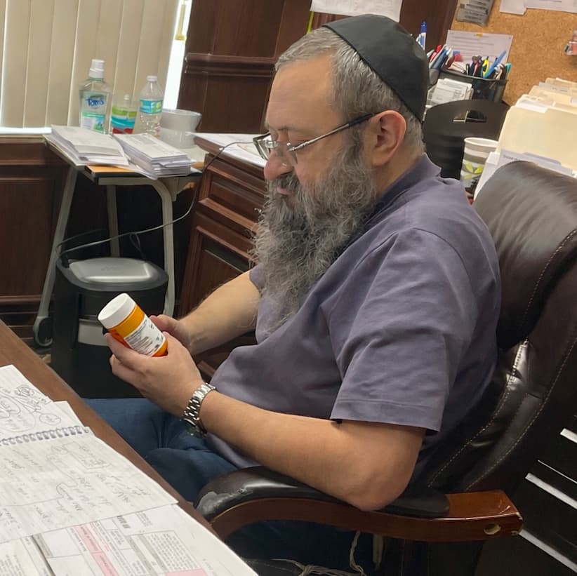 Dr. Zelenko at the desk